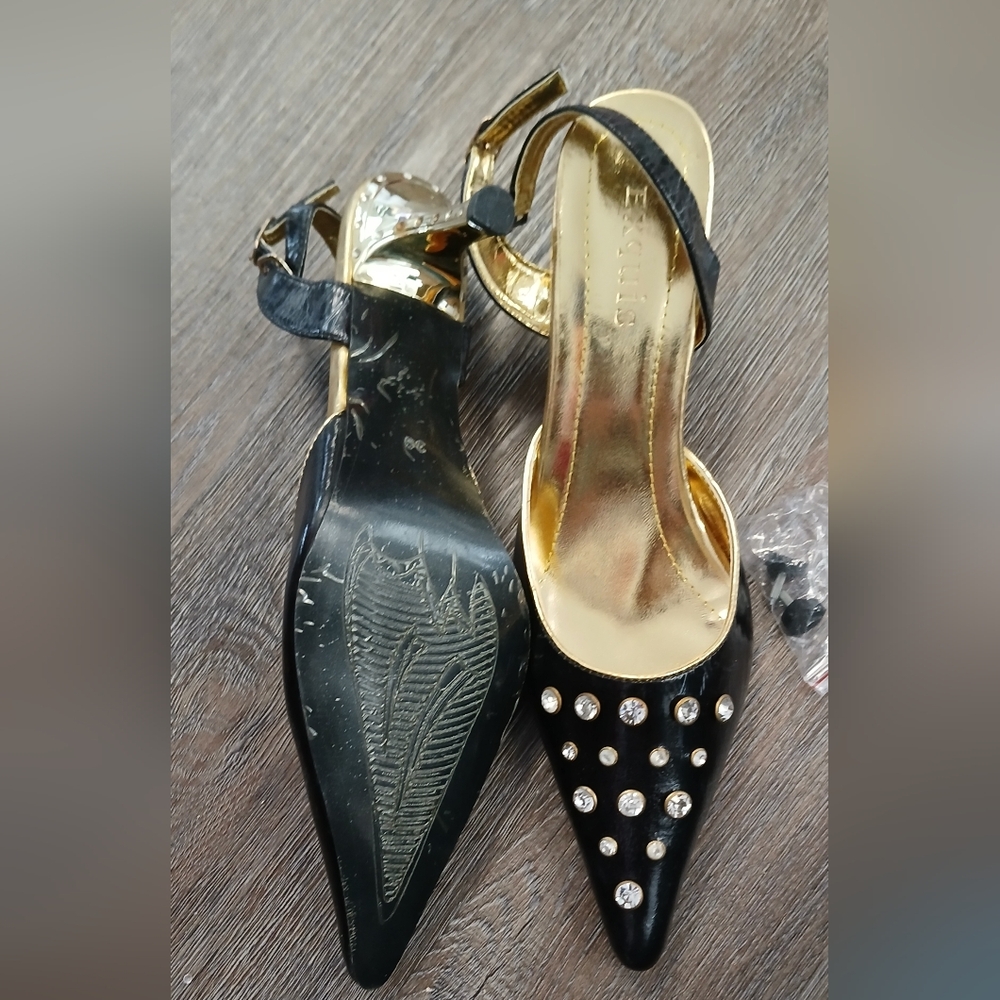 Black and Gold Heels with Sleek Pointed Toe
